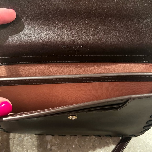 Rich chocolate brown mini bag has an adjustable shoulder strap and gold letters - Picture 6 of 12